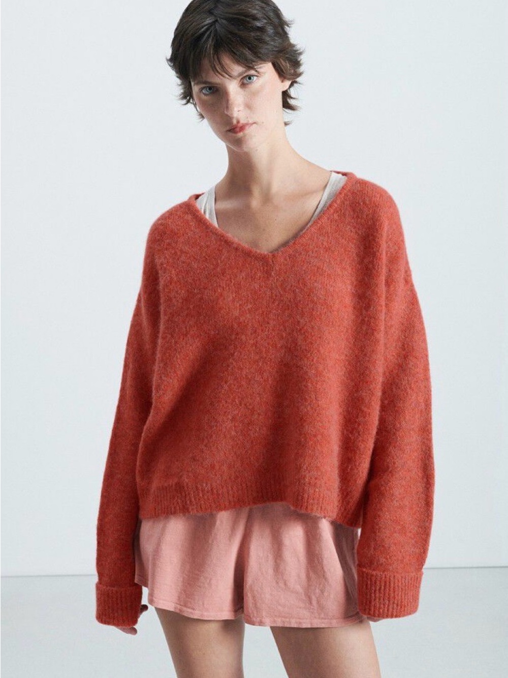 Free People Relaxed V-Neck Sweater in Rust Orange